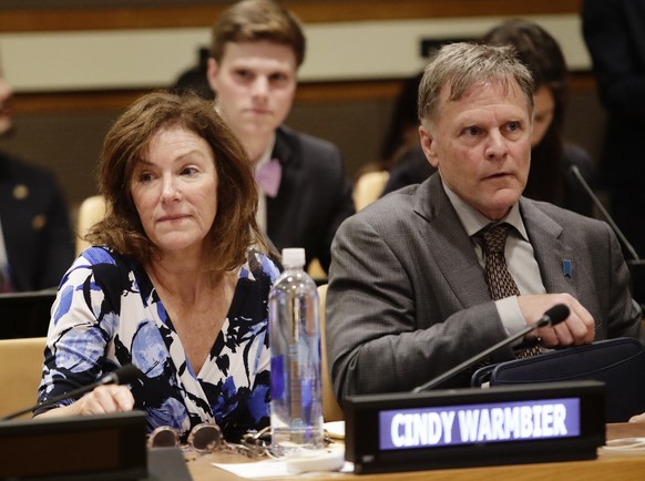 FILE - in this May 3, 2018, file photo, Fred Warmbier, right, and Cindy Warmbier, parents of Otto Warmbier, an American who died last year, days after his release from captivity in North Korea, attend ...