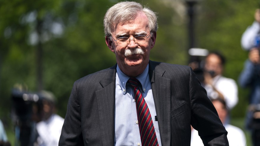 epa07832879 (FILE) - National Security Advisor John Bolton departs after speaking to the media about the uprising in Venezuela outside the West Wing of the White House in Washington, DC, USA, 30 April ...