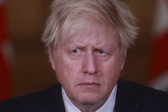 Britain&#039;s Prime Minister Boris Johnson speaks during a news conference in response to the ongoing situation with the coronavirus (COVID-19) pandemic, inside 10 Downing Street in London, Tuesday,  ...