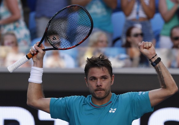 Switzerland&#039;s Stan Wawrinka celebrates his win against Italy&#039;s Andreas Seppi during their fourth round match at the Australian Open tennis championships in Melbourne, Australia, Sunday, Jan. ...
