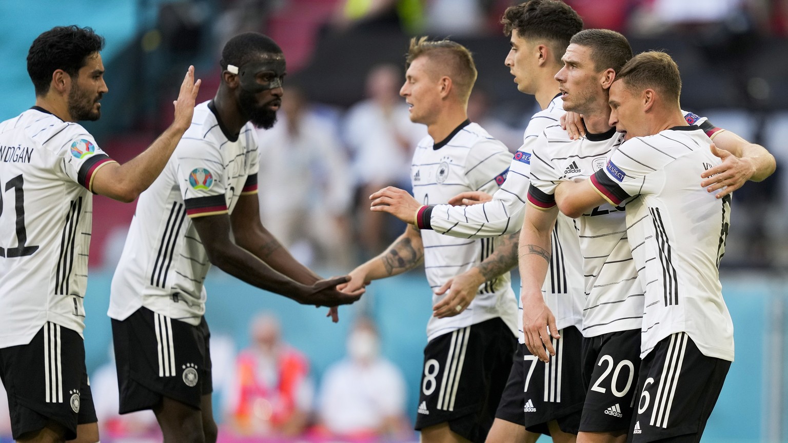 epa09286466 Germany players celebrate a goal against Portugal during the UEFA EURO 2020 group F preliminary round soccer match between Portugal and Germany in Munich, Germany, 19 June 2021. EPA/HUGO D ...