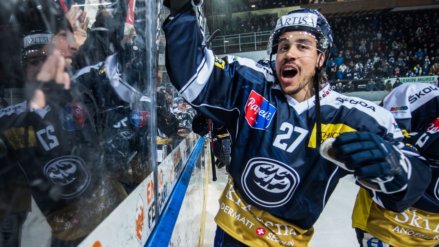 Ambri&#039;s player Samuel Guerra celebrate the victory at the end of the game game of National League Swiss Championship 2018/19 between HC Ambri Piotta and HC Lugano, at the ice stadium Valascia in  ...