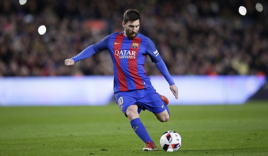 FC Barcelona&#039;s Lionel Messi kicks the ball to scores during a Copa del Rey, 16 round, second leg, between FC Barcelona and Athletic Bilbao at the Camp Nou in Barcelona, Spain, Wednesday, Jan. 11, ...