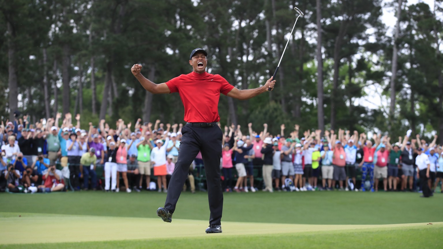 epaselect epa07507100 Tiger Woods of the US celebrates after winning the 2019 Masters Tournament at the Augusta National Golf Club in Augusta, Georgia, USA, 14 April 2019. The 2019 Masters Tournament  ...