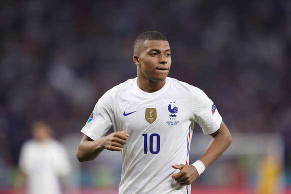 epa09297501 Kylian Mbappe of France in action during the UEFA EURO 2020 group F preliminary round soccer match between Portugal and France in Budapest, Hungary, 23 June 2021. EPA/Alex Pantling / POOL  ...