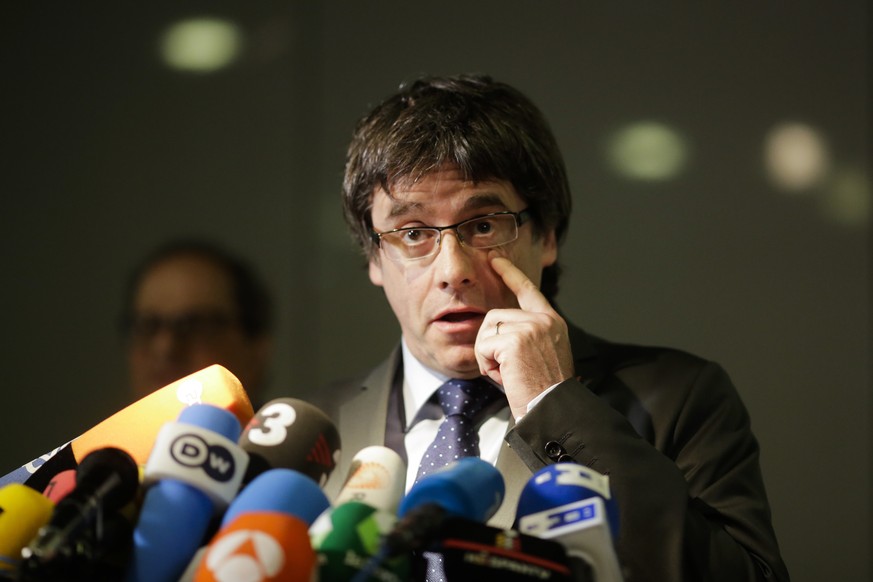 FILE - In this May 15, 2018 file photo former Catalan leader, Carles Puigdemont, addresses the media during a news conference in Berlin, Germany. A German court on Thursday, July 12, 2018 decided that ...