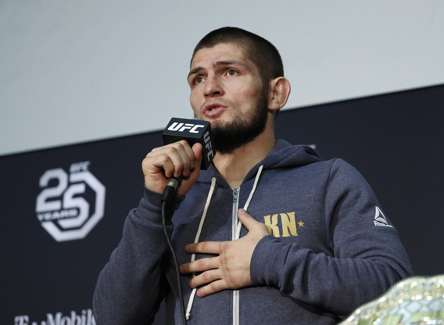Khabib Nurmagomedov speaks at a news conference after the UFC 229 mixed martial arts event Saturday, Oct. 6, 2018, in Las Vegas. A brawl broke out after the main event between Khabib Nurmagomedov and  ...