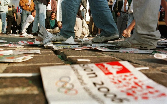 Supporters of the cadidature Sion 2006 show their disappointment and grief in Sion, Switzerland, Saturday, June 19, 1999 after the International Olympic Committee (IOC) president Juan-Antonio Samaranc ...