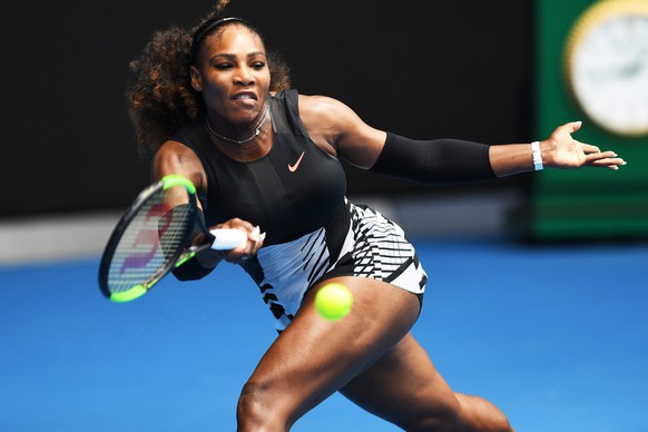 epa05722745 Serena Williams of the USA in action against Belinda Bencic of Switzerland during round one of the Women&#039;s Singles of the Australian Open Grand Slam tennis tournament in Melbourne, Vi ...