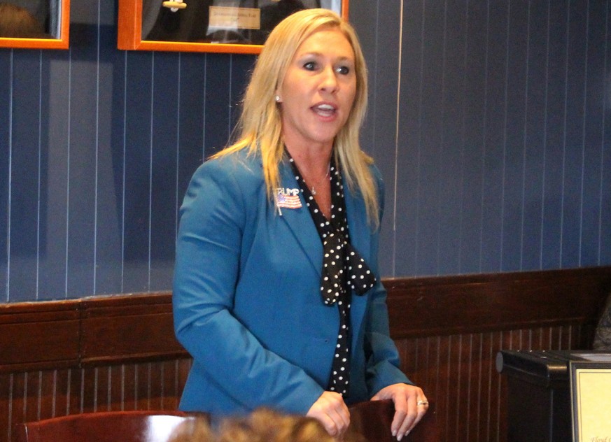 FILE - In this March 3, 2020, file photo, Republican Marjorie Taylor Greene speaks to a GOP women&#039;s group in Rome, Ga. Greene, criticized for promoting racist videos and adamantly supporting the  ...