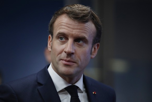 FILE - In this Friday, Dec. 13, 2019 file photo, French President Emmanuel Macron arrives for an EU summit in Brussels. France&#039;s leader has sparked a fresh barrage of anger from critics by reaffi ...