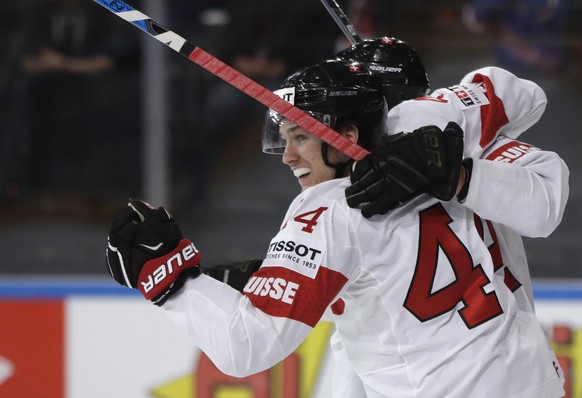 Switzerland&#039;s Pius Suter celebrates scoring his sides third goal during the Ice Hockey World Championships group B match between Norway and Switzerland in the AccorHotels Arena in Paris, France,  ...