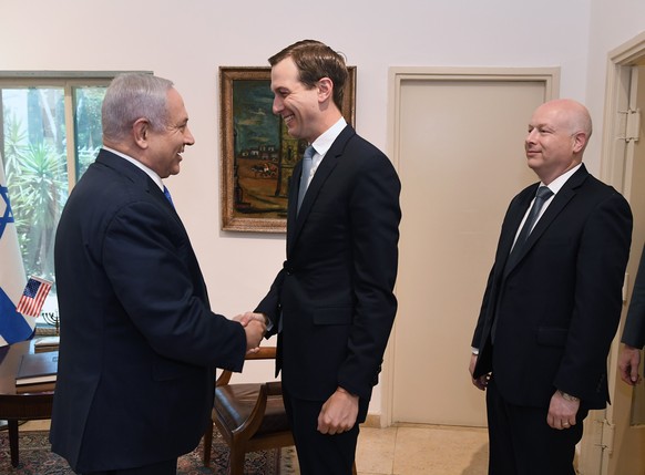epa07612511 A handout photo made available by the US Embassy to Israel in Jerusalem shows the Israeli Prime Minister Benjamin Netanyahu (L) meets with US President Trump’s senior adviser Jared Kushner ...