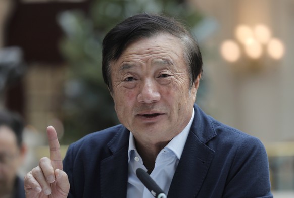 Ren Zhengfei, founder and CEO of Huawei, gestures during a round table meeting with the media in Shenzhen city, south China&#039;s Guangdong province, Tuesday, Jan. 15, 2019. The founder of network ge ...