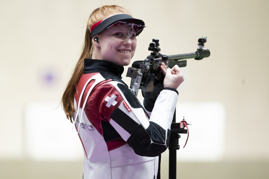 Nina Christen of Switzerland reacts after winning the gold medal in the women&#039;s shooting 50m Rifle 3 Positions Finals at the 2020 Tokyo Summer Olympics in Tokyo, Japan, on Saturday, July 31, 2021 ...