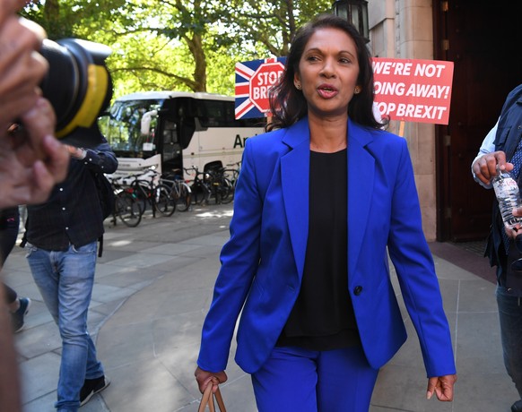 epa07800714 Anti Brexit campaigner, Gina Miller leaves a television studio in Westminster, London, Britain, 29 August 2019. The UK government is to suspend Parliament after the summer break, a move th ...