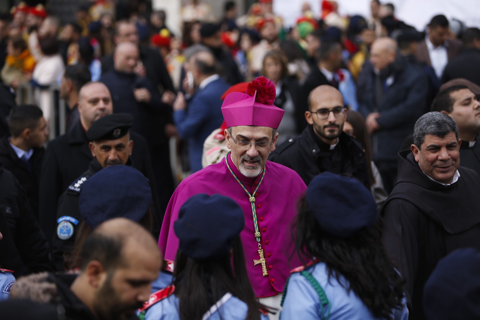 The Latin Patriarch of Jerusalem Pierbattista Pizzaballa arrives to the Church of the Nativity, built atop the site where Christians believe Jesus Christ was born, on Christmas Eve, in the West Bank C ...