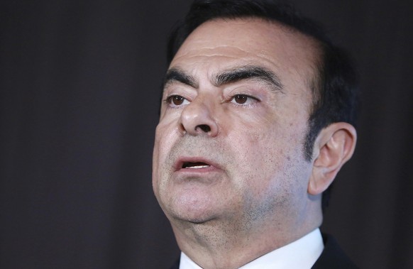 FILE - In this May 12, 2016, file photo, then Nissan Motor Co. President and CEO Carlos Ghosn speaks during a press conference in Yokohama, near Tokyo. Japanese Justice Minister Masako Mori vowed Mond ...