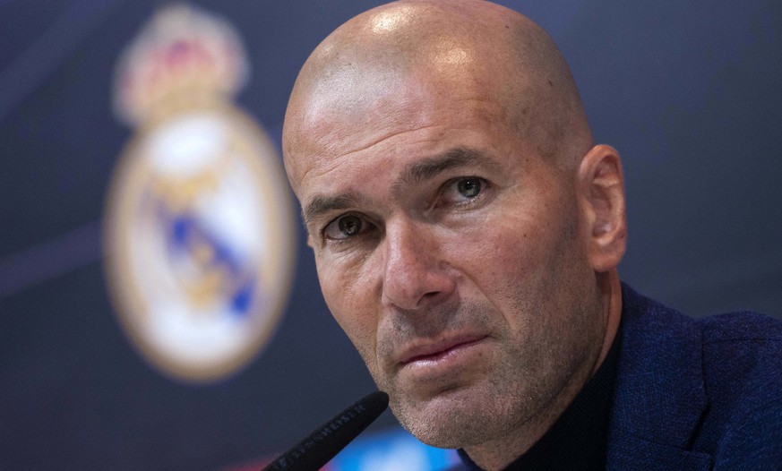 Zinedine Zidane listens to the questions of journalists during a press conference in Madrid, Spain, Thursday, May 31, 2018. Zidane quit as Real Madrid coach on Thursday, less than a week after leading ...