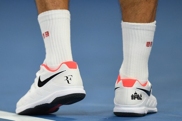 epa07302651 A detailed view of the shoes of Roger Federer of Switzerland showing his initials during the match against Stefanos Tsitsipas of Greece at the Australian Open Grand Slam tennis tournament  ...