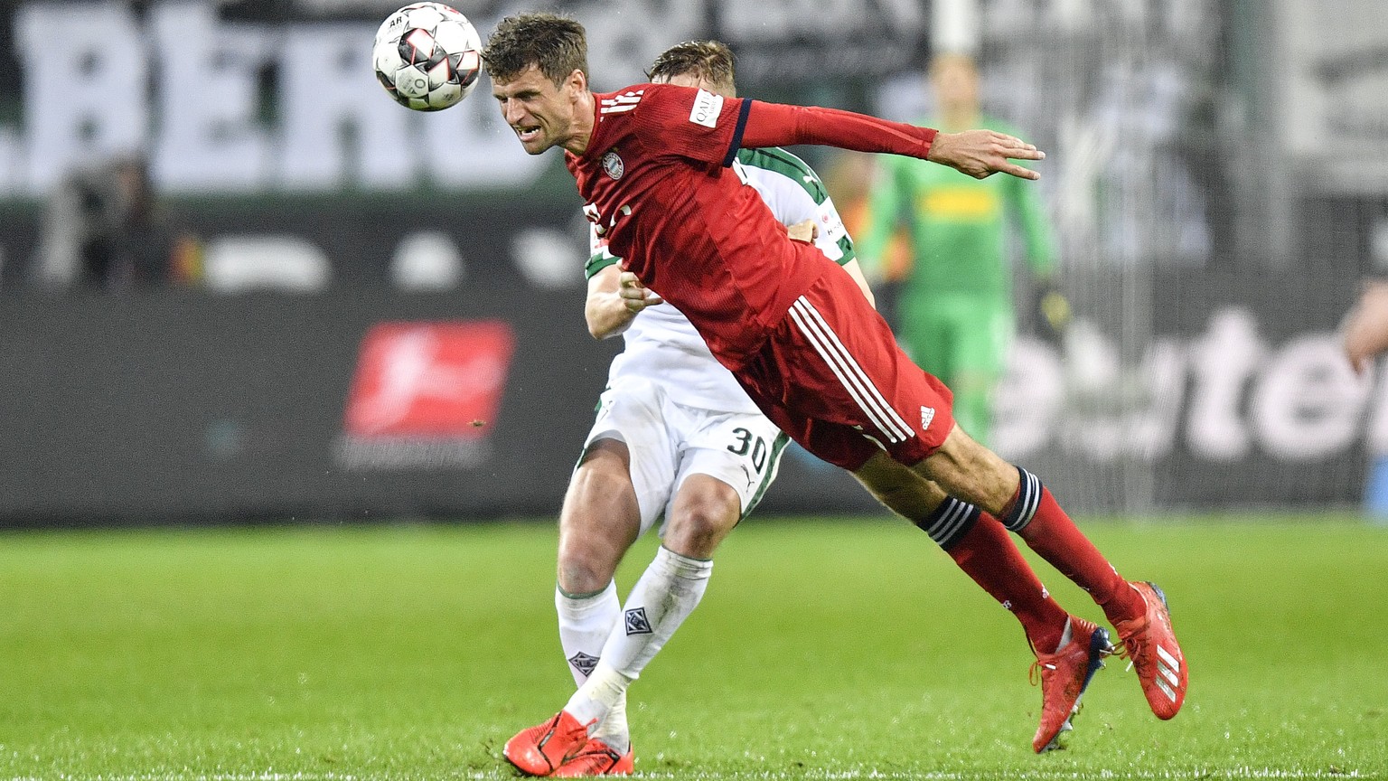 Bayern&#039;s Thomas Mueller jumps for the ball during the German Bundesliga soccer match between Borussia Moenchengladbach and FC Bayern Munich in Moenchengladbach, Germany, Saturday, March 2, 2019.  ...