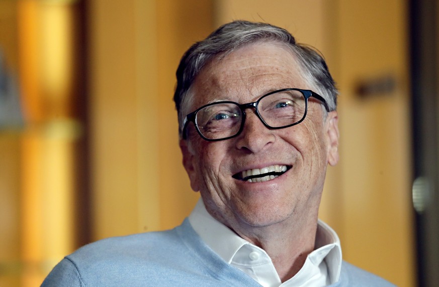 FILE - In this Feb. 1, 2019, file photo, Bill Gates smiles while being interviewed in Kirkland, Wash. Washington state&#039;s richest residents, including Gates and Jeff Bezos, would pay a wealth tax  ...