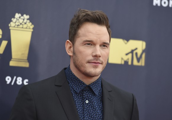 FILE - In this June 16, 2018 file photo, Chris Pratt arrives at the MTV Movie and TV Awards at the Barker Hangar in Santa Monica, Calif. Pratt says &quot;it&#039;s not an easy time&quot; as he and the ...