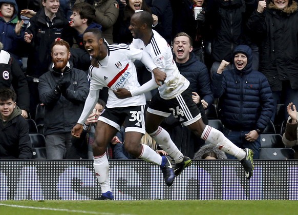 Fulham&#039;s Ryan Sessegnon celebrates scoring his side&#039;s third goal of the game with Sone Aluko, right, during the English FA Cup, Fourth Round match, Fulham vs Hull City at Craven Cottage, Lon ...