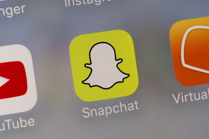 FILE - This Wednesday, Aug. 9, 2017, file photo shows the Snapchat app. The Wall Street Journal reports Friday, Jan. 18, 2019, that Snap recently fired two executives after one allegedly had an inappr ...