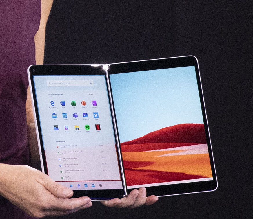 Microsoft Program Manager Carmen Zlateff discusses the Surface Neo during a Microsoft event, Wednesday, Oct. 2, 2019, in New York. (AP Photo/Mark Lennihan)
