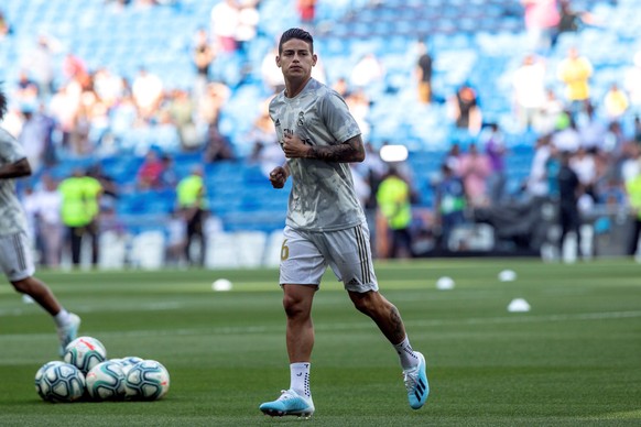 epa07790841 Real Madrid&#039;s midfielder James Rodriguez warms up before the Spanish LaLiga match between Real Madrid and Real Valladolid at Santiago Bernabeu stadium in Madrid, Spain, 24 August 2019 ...