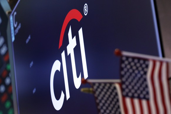 FILE - In this Feb. 8, 2019, file photo, the logo for Citigroup appears above a trading post on the floor of the New York Stock Exchange. CitigroupÄôs fourth-quarter profits rose by 15% from a year e ...
