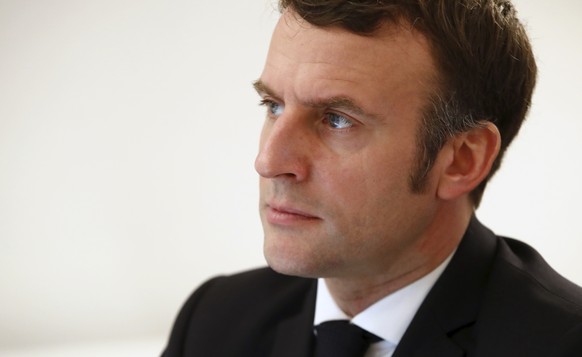 French President Emmanuel Macron attends a EU-China video-conference along with Chinese President Xi Jinping, German Chancellor Angela Merkel, European Commission President Ursula von der Leyen and Pr ...