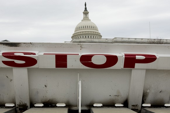 epa07268421 A barricade is seen on the grouds of the the US Capitol Building in Washington, DC, USA, 07 January 2019. A partial shutdown of the US federal government continues since Congress and Trump ...