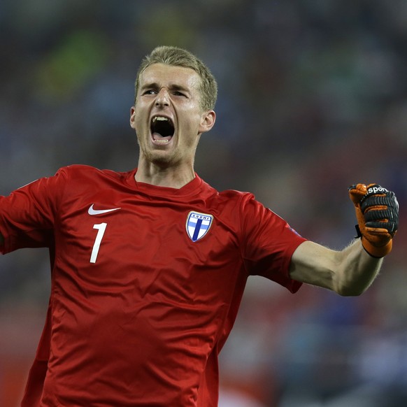 Finland goalkeeper Lukas Hradecky reacts after the opening goal of his team against Greece during the Euro 2016 qualifying match between Greece and Finland at the Georgios Karaiskakis stadium in Pirae ...