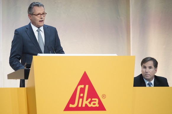 epa04704099 Paul Johann Haelg (L), Chairman of Sika, speaks at the side of Jan Jenisch, Chief Executive Officer of Sika, during the 2015 Annual General Meeting of Sika in Baar, Switzerland, 14 April 2 ...