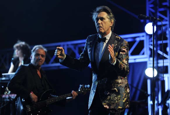 Bryan Ferry performs at the 2014 Coachella Music and Arts Festival on Friday, April 11, 2014, in Indio, Calif. (Photo by Chris Pizzello/Invision/AP)
