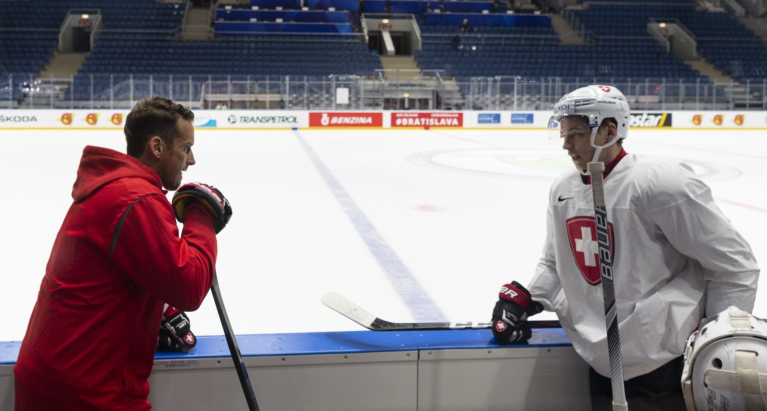 Switzerland&#039;s coach Patrick Fischer and Switzerland&#039;s Philipp Kurashev during a training session of the Swiss team at the IIHF 2019 World Ice Hockey Championships, at the Ondrej Nepela Arena ...