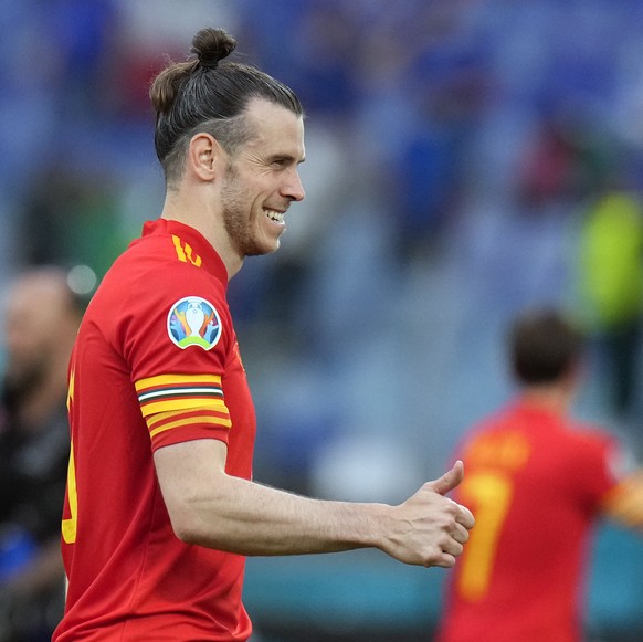Wales&#039; Gareth Bale gives the thumb-up sign at the end of the Euro 2020 soccer championship group A match between Italy and Wales, at the Rome Olympic stadium, Sunday, June 20, 2021. Italy won 1-0 ...