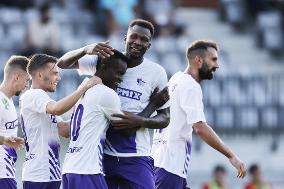 Chukwuebuka Onovo, center, of Ujpest celebrates with team mates after scoring a against FC Vaduz during the UEFA Conference League second qualifying round soccer match between FC Vaduz and FC Ujpest B ...