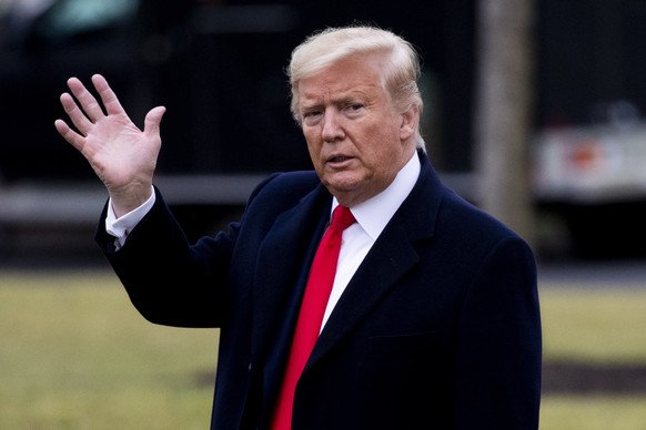 epa08173818 US President Donald J. Trump waves as he walks across the South Lawn of the White House to depart by Marine One, in Washington, DC, USA, 28 January 2020. Trump travels to New Jersey for a  ...