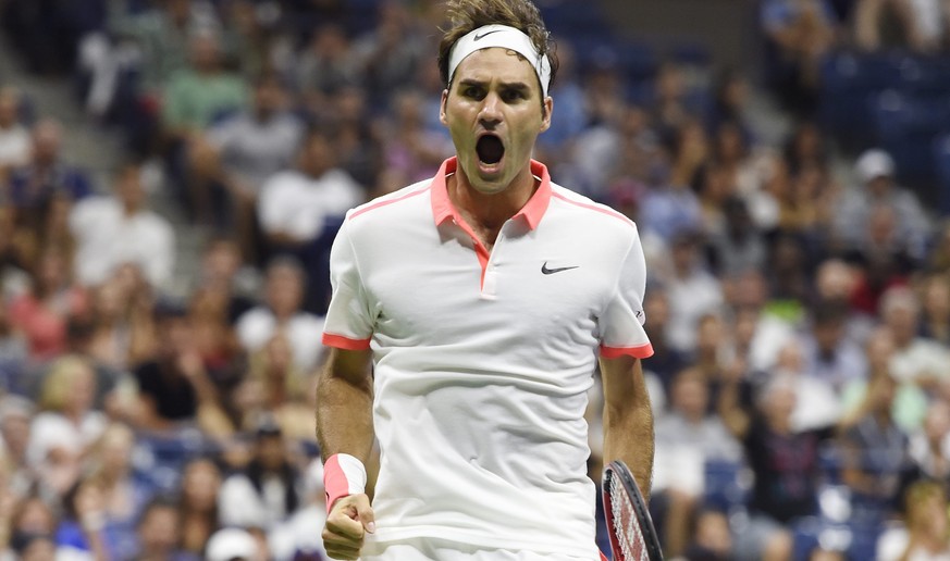 epa04919508 Roger Federer of Switzerland reacts after defeating John Isner of the US during their match on the eighth day of the 2015 US Open Tennis Championship at the USTA National Tennis Center in  ...