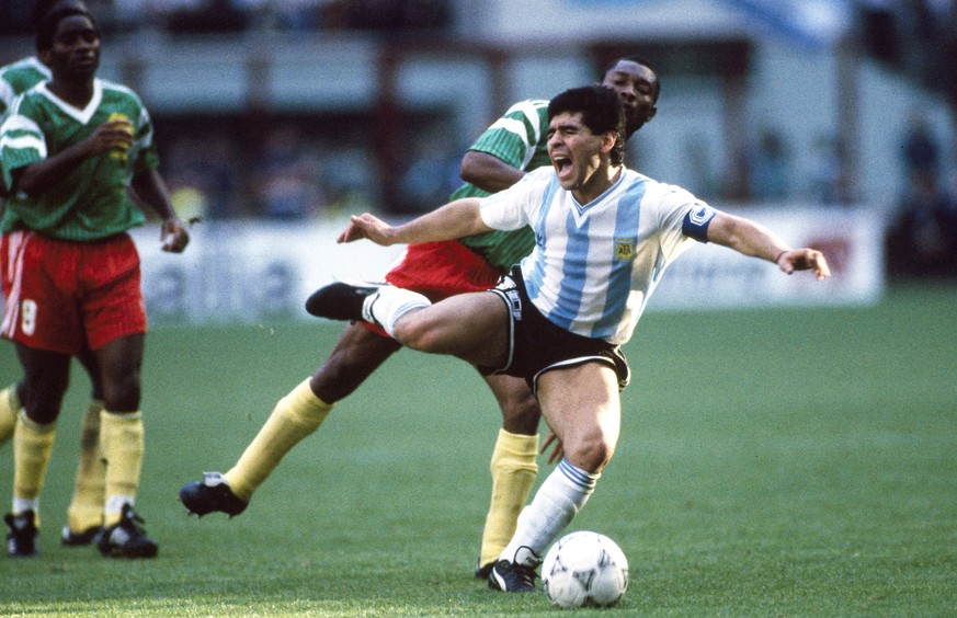 08 June 1990 - FIFA World Cup - Argentina v Cameroon - Argentinean captain Diego Maradona yells as he is tackled. (Photo by Mark Leech/Getty Images)