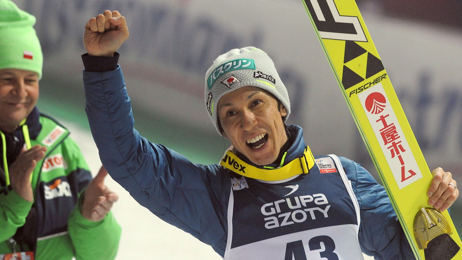 Japan&#039;s Noriaki Kasai celebrates his third place in the 34th World Cup Ski Jumping competition, in Wisla, Poland, Friday, March 4, 2016. (AP Photo/Alik Keplicz)