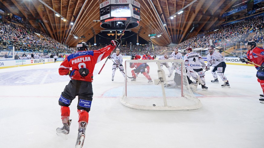 Team Suisse Player Vincent Praplan celebrates after the 3-0 during the game between Team Suisse and Dinamo Riga at the 91th Spengler Cup ice hockey tournament in Davos, Switzerland, Tuesday, December  ...