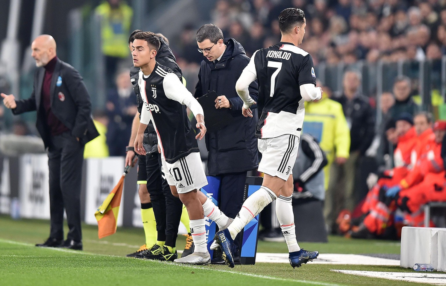 Juventus&#039; Cristiano Ronaldo and Paulo Dybala during the Italian Serie A soccer match Juventus FC vs AC Milan at Allianz stadium in Turin, Italy. (Alessandro Di Marco/ANSA via AP)