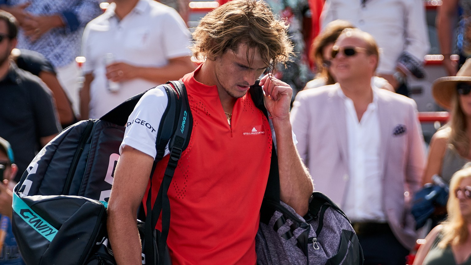 epa07765023 Alexander Zverev of Germany leaves the court after he lost against Karen Khachanov of Russia during the Men&#039;s Singles quarter-final at the Rogers Cup tennis tournament in Montreal, Ca ...