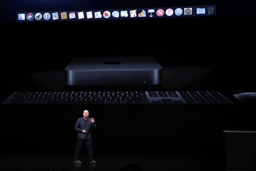 epa07131356 Apple Senior Director of Mac Hardware Product Marketing, Tom Boger, speaks about the new Mac mini during an Apple special event at the Howard Gilman Opera House at the Brooklyn Academy of  ...