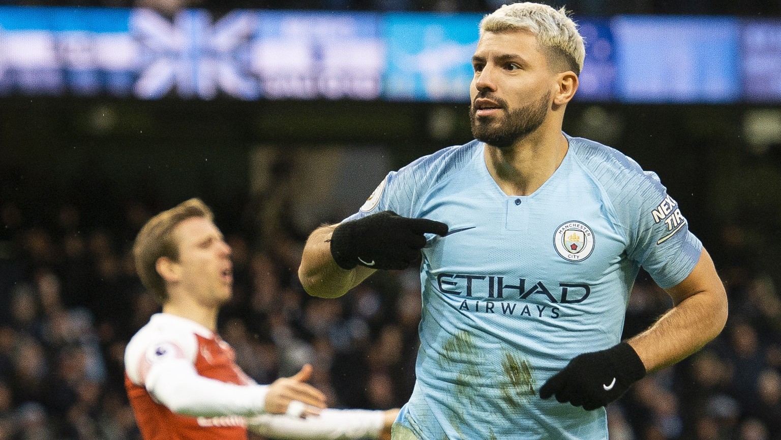 epa07341367 Manchester City&#039;s Sergio Aguero celebrates scoring during the English Premier League soccer match between Manchester City and Arsenal held at the Etihad Stadium in Manchester, Britain ...