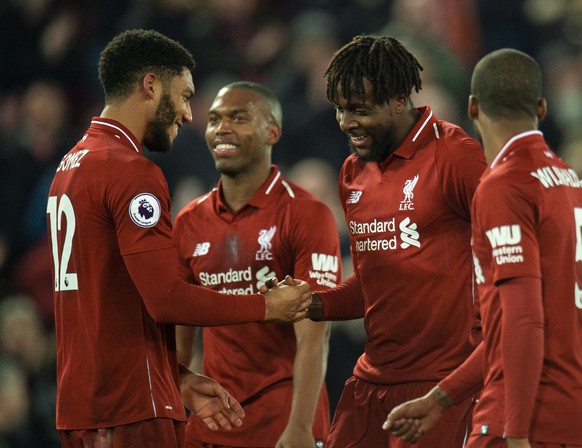 epa07204465 Liverpool&#039;s Divock Origi (2-R) celebrates with teammates during the English Premier League soccer match between Liverpool and Everton at the Anfield in Liverpool, Britain, 02 December ...